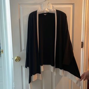 Joan Rivers Black and White Dressy Jacket. Uneven hem and open front no buttons.